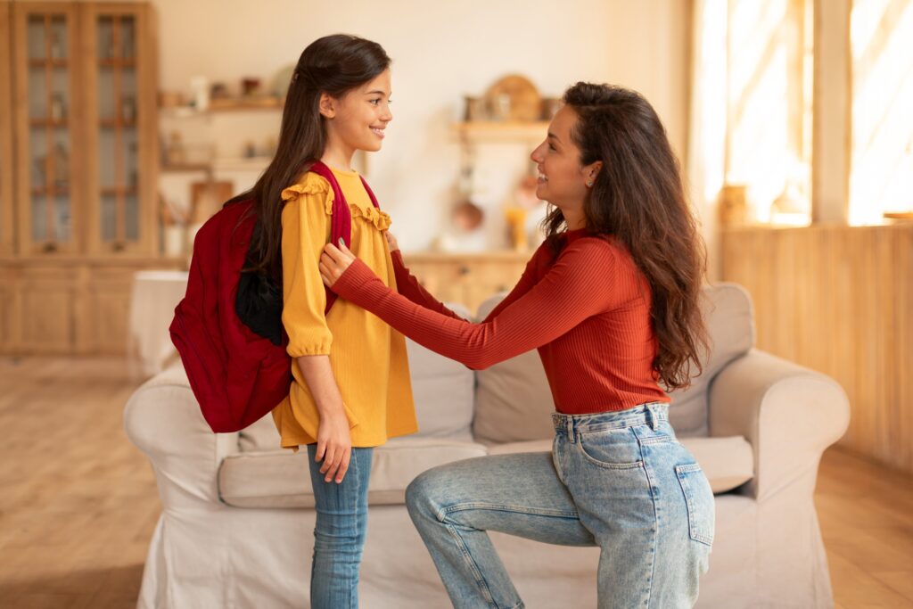 Before,School,Preparation.,Side,View,Of,Smiling,Arab,Mother,Preparing